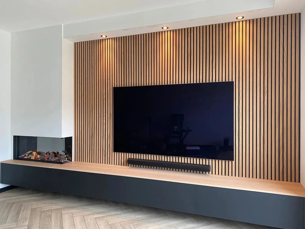 Fluted wood-slat feature wall in a bright residential living room