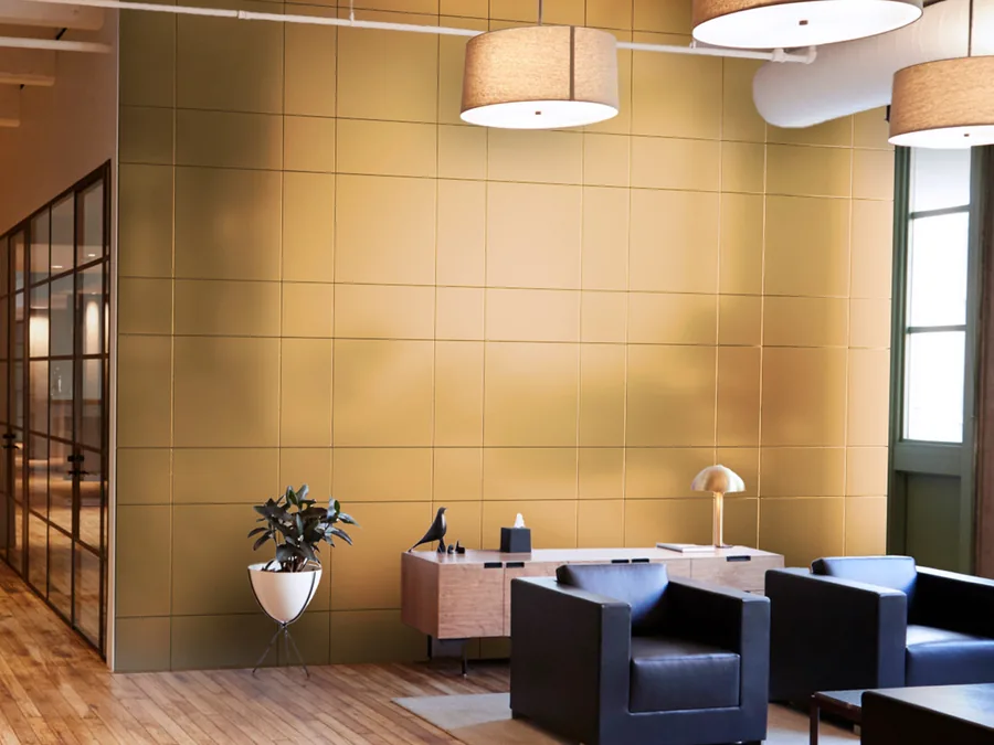 Hotel lounge with warm timber wall panels